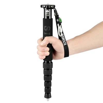 Monopé de fotografia preto com pega acolchoada e correia de mão com bússola