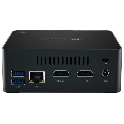 Mini PC preto com portas USB, LAN, HDMI e entrada DC numa superfície plana