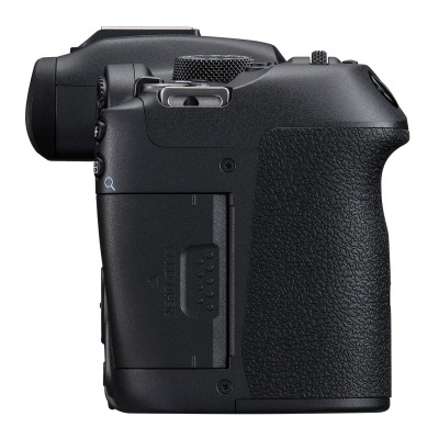 Câmara digital DSLR preta vista de lado com textura preta na pega.