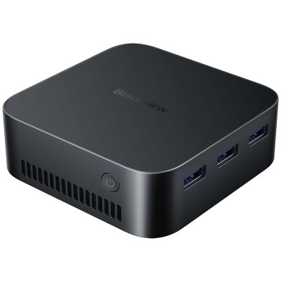 Mini PC preto com portas USB azuis e botão de ligar
