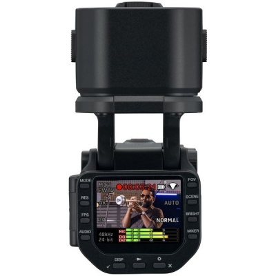 Equipamento com ecrã digital a cores a mostrar músico a tocar trompete e botões com texto