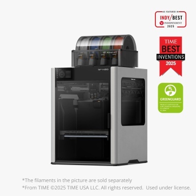 Impressora 3D Bambu Lab H2D com carretéis de filamento coloridos no topo