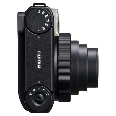 Câmara digital Fujifilm preta vista de lado com lentes retráteis