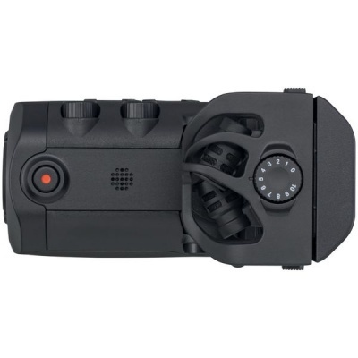 Aparato eletrônico preto com botões e disco numérico