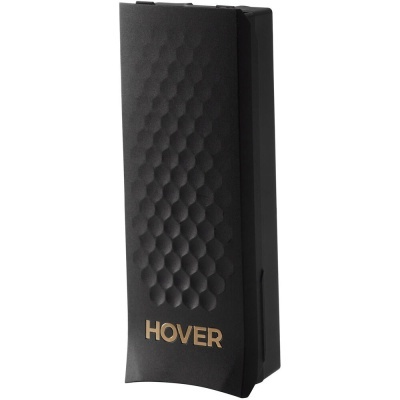 Embalagem preta alta com padrão hexagonal e texto dourado HOVER.