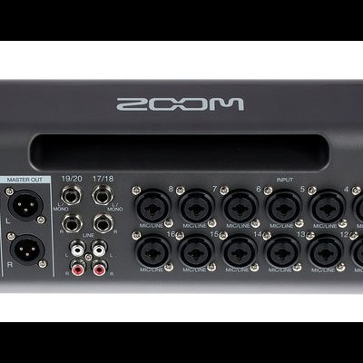 Mixer de áudio Zoom preto com múltiplas entradas e conexões