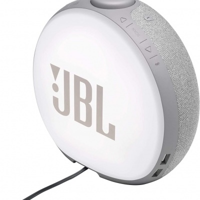 Coluna portátil JBL redonda branca com traseira cinza de tecido e botões no topo