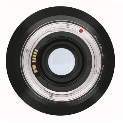 Parte traseira de objetiva fotográfica com anel metálico e ponto vermelho