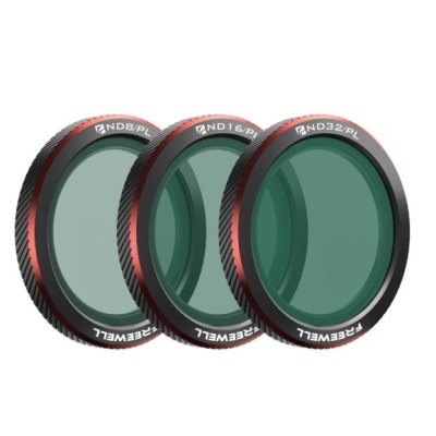 Três filtros de densidade neutra para câmaras com molduras preta e vermelha.