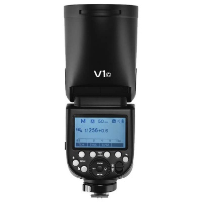 Flash fotográfico preto com ecrã digital azul e texto V1c