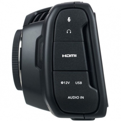 Câmara de vídeo preta com painéis e botões laterais