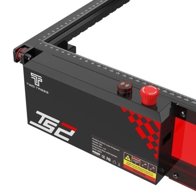 Regua medidora preta e vermelha com escala e botões giratórios