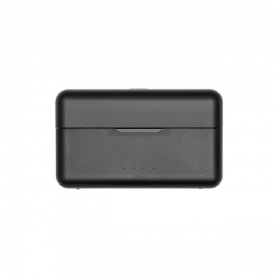 Caixa preta compacta com textura riscada e indicadores de carga.