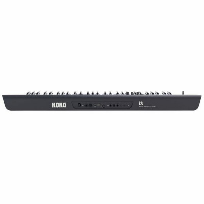 Teclado midi KORG i3 preto com botões e discos em preto e branco