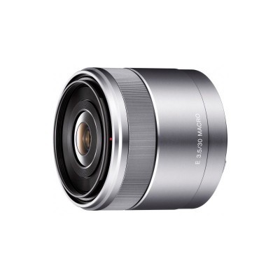 Lente fotográfica cinza prateada com texto E 3.5/30 MACRO