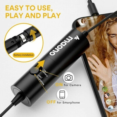 Dispositivo preto com interruptor ao lado de um telemóvel com vídeo chamada