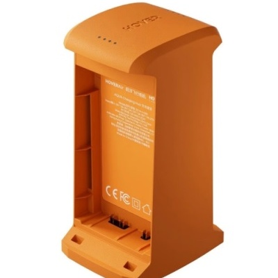 Base carregadora laranja HoverAIR H9 com texto e luzes LED
