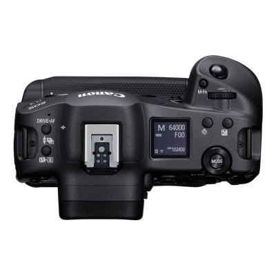 Câmara Canon DSLR preta vista de cima com ecrã digital e botões de controlo.