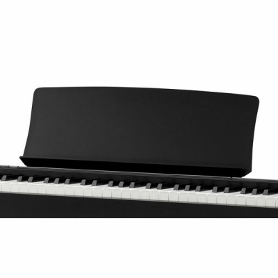 Piano digital preto com teclado e suporte para partituras