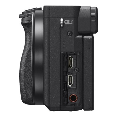 Lado esquerdo de câmara digital preta com entradas USB, HDMI e porta de áudio