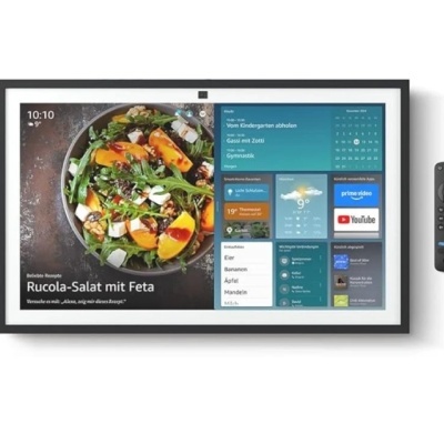 Monitor digital com receita de salada e telecomando preto