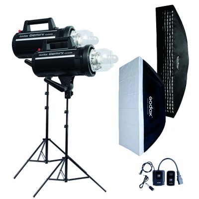 Kit de iluminação profissional inclui duas lâmpadas Godox Gemini GS400II, tripés, softbox e acessórios.