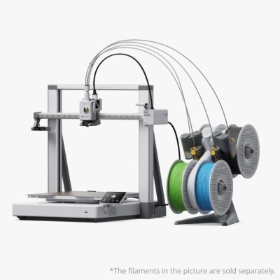 Impressora 3D branca e cinza com bobinas de filamento verde, azul e cinza