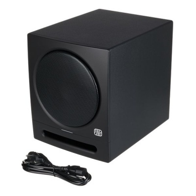 Subwoofer preto com grelha circular e cabo elétrico