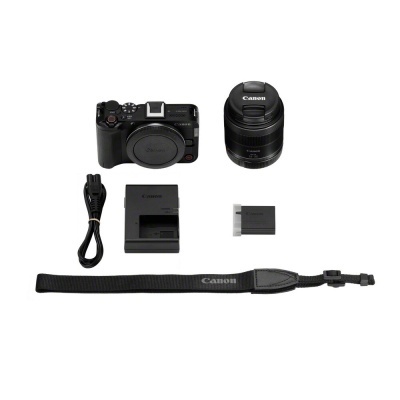 Câmara Canon preta, lente Canon, cabo de alimentação, carregador, bateria e pega de pulso