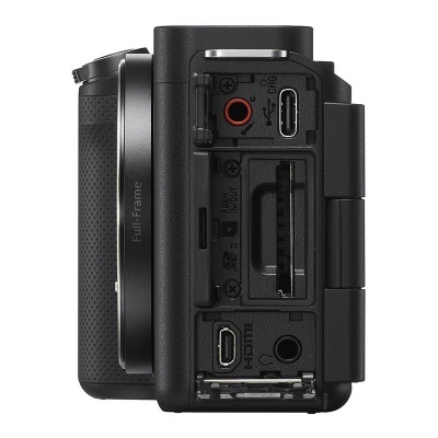 Câmara fotográfica preta com portas USB, HDMI e entrada para cartões