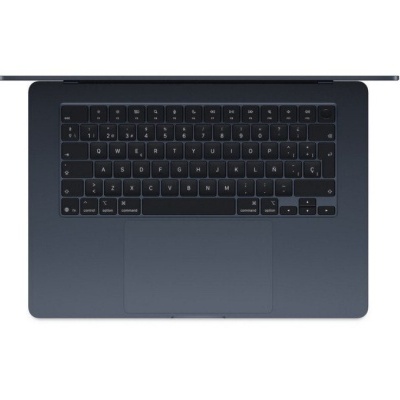 Computador portátil cinza escuro visto de cima com teclado em português