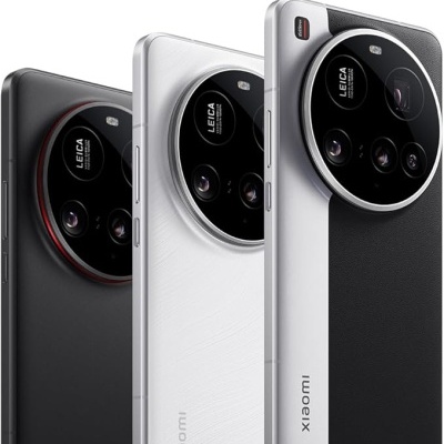 Três telemóveis Xiaomi com câmaras Leica em cores preto, branco e branco com preto.