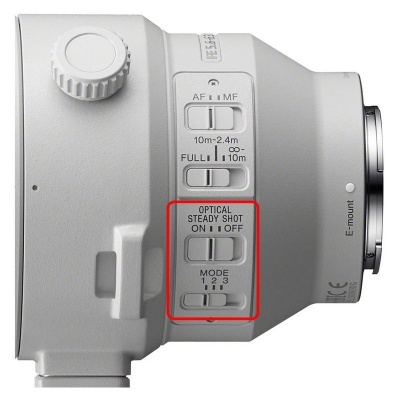 Objetiva de câmera branca com vários interruptores e marcação E-mount