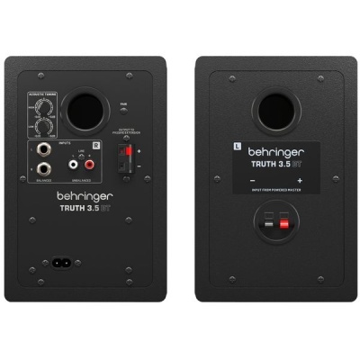 Conjunto de colunas de estúdio Behringer preto com controlos e entradas no verso