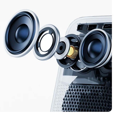 Componentes desmembrados de altifalantes pretos com estrutura plástica transparente