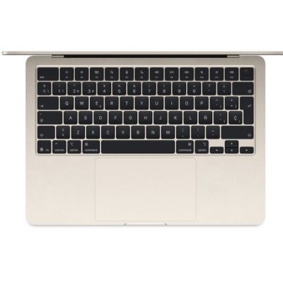 Computador portátil dourado aberto visto de cima com teclado preto