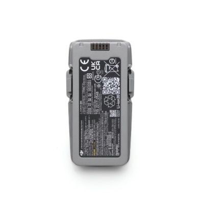 Bateria DJI recarregável cinzenta para drone com etiquetas e símbolos de certificação