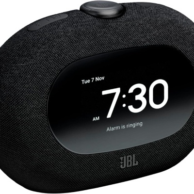 Rádio despertador digital preto com ecrã OLED oval e botão superior