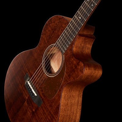 Guitarra acústica castanho escuro com corpo recortado e marcas em cruz nos trastes