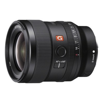 Lente fotográfica preta da Sony com anel de controlo e marca G laranja