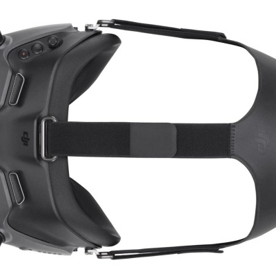 Óculos de realidade virtual ou drone preto com controles e etiqueta DJI