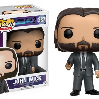 Funko Pop! John Wick 2 figura em vinil com fato cinzento e arma, ao lado da caixa original.