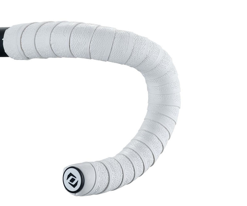 Punho de guiador de bicicleta com fita branca perforada e tampa preta com símbolo