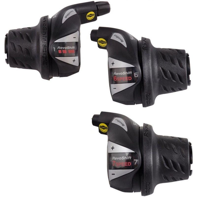 manetes de mudança de velocidade para bicicleta pretas com texto RevoShift 6 SPEED e 7 SPEED