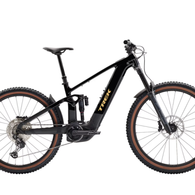 Bicicleta elétrica de montanha preta com detalhes amarelos e pneus grossos