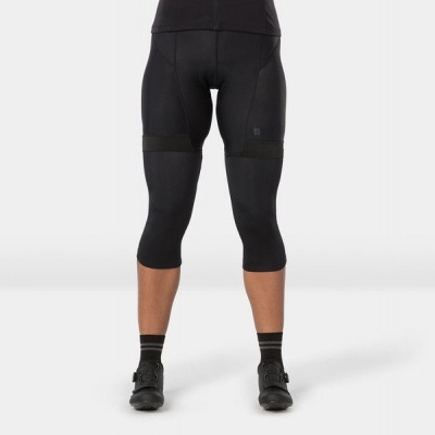 Calças desportivas pretas 3/4 com detalhes nos joelhos