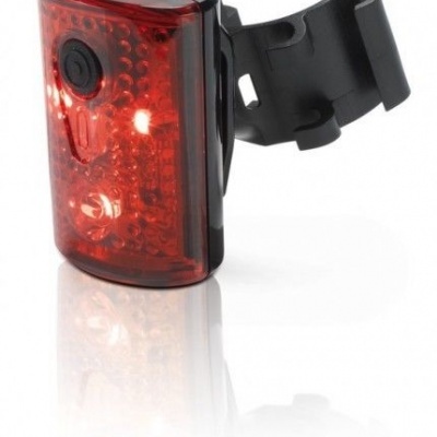 Luz traseira de bicicleta vermelha com abraçadeira preta