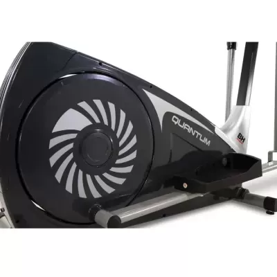 Bicicleta elíptica preta e prata com texto QUANTUM e logo BH