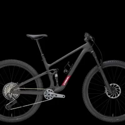 Bicicleta de montanha preta com suspensão e pneus grossos