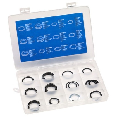 Caixa transparente com anéis de vedação e instruções azuis